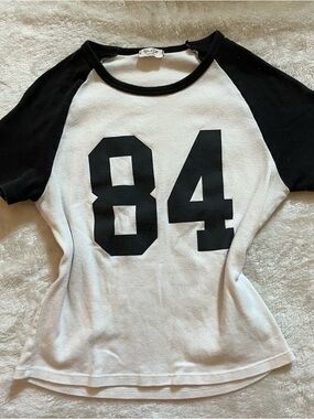 Brandy Melville White and Black '84' Raglan Tee